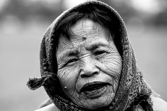 Old woman in countryside