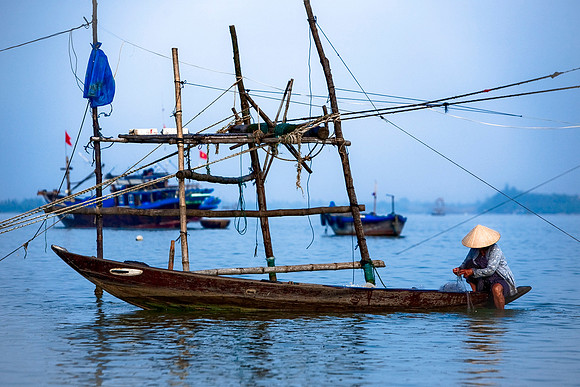 Traditional fishing by old woman